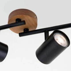 Briloner Muritz Spotleuchte, Schwenkbar, Holzbasis, GU10, Schwarz -Briloner Store spotleuchte schwarz mit holz 4xgu10 detail1 7fddda098303a9e1cff2f1ee2a169879